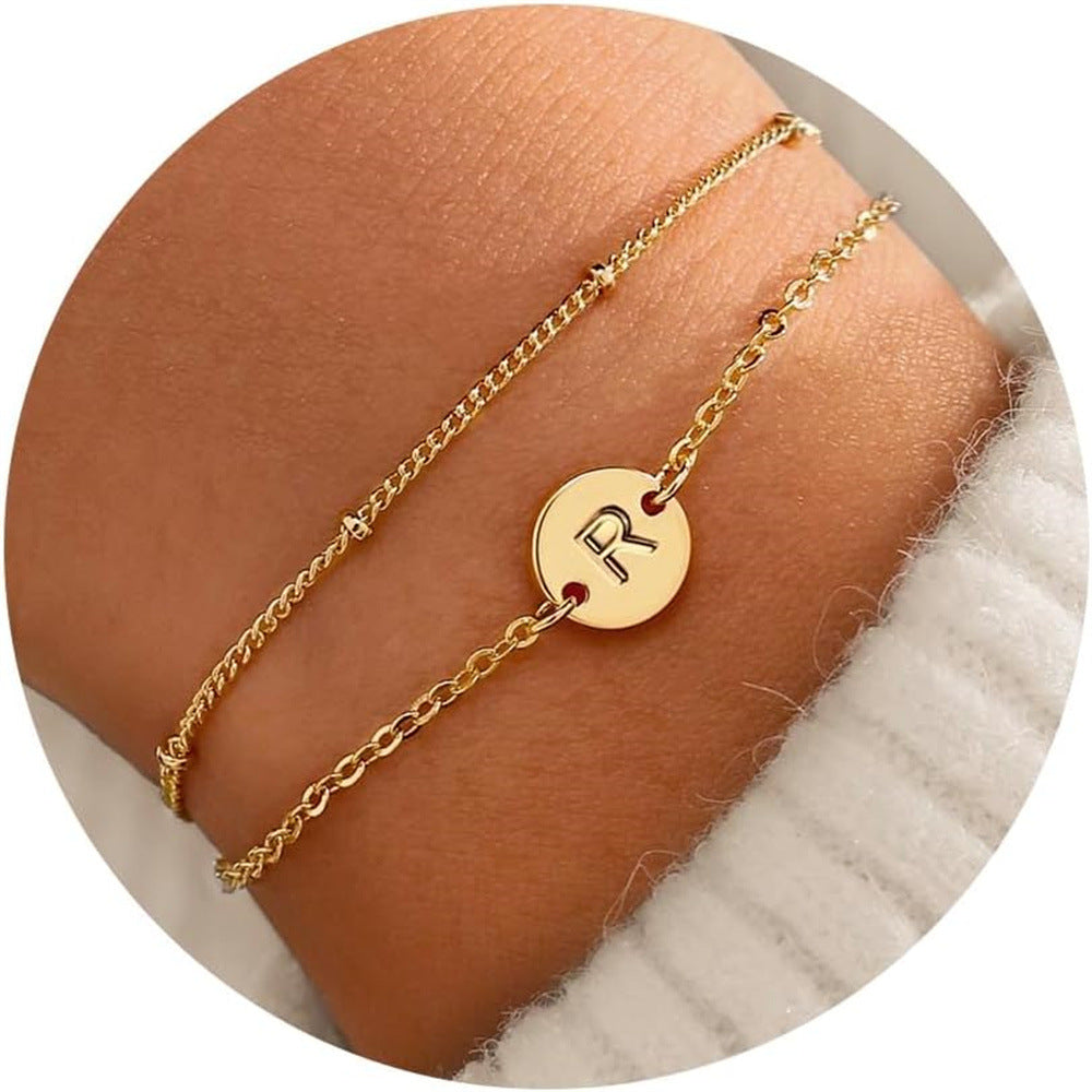 Pulsera doble capa de letras redondas plateadas, de acero inoxidable para mujer, con cuentas pequeñas en forma de arroz, en capas