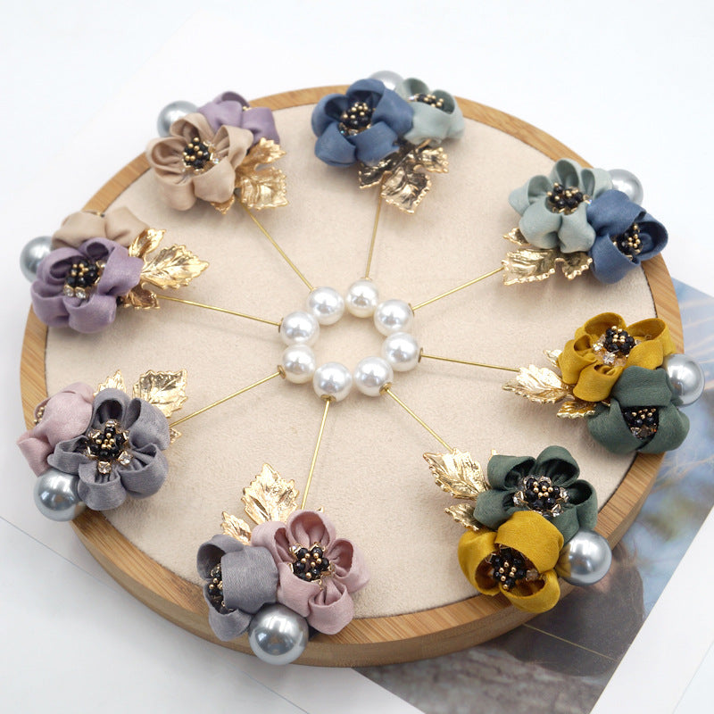 Broche de flor de perla