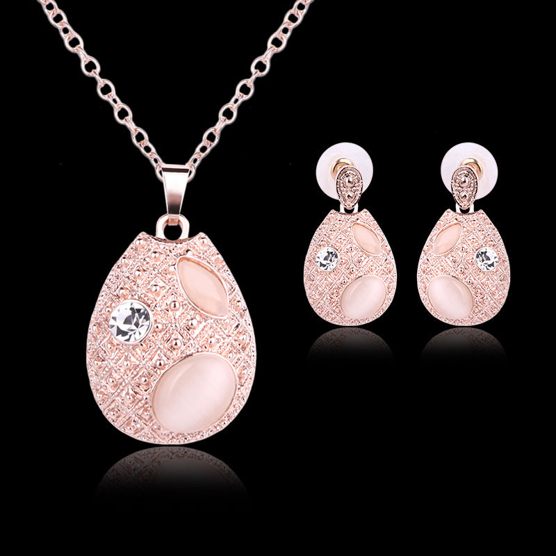 Zweiteiliges Schmuckset aus ovaler Opal-Halskette und Ohrringen