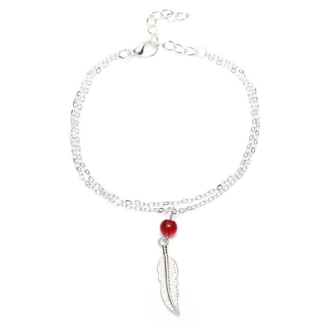 Tobillera de plumas con cuentas de cristal