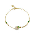 Pulsera de lujo ligero de estilo retro de hadas, de jade hetian con incrustaciones de oro antiguo y hebilla de la paz esmaltada.