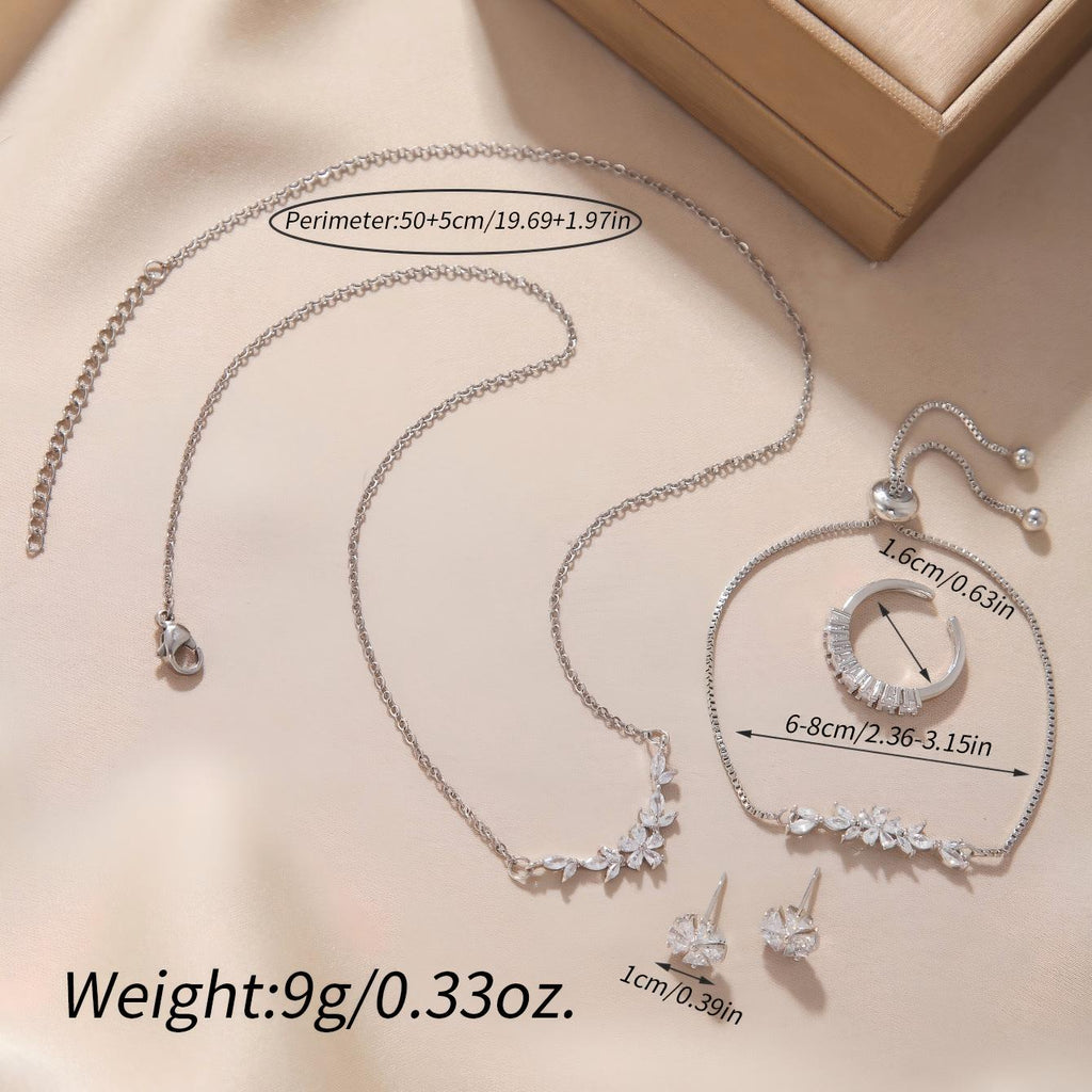Schlichtes, elegantes Zirkon-Schmuckset, silberne Blumenkette, exquisite Ohrringe, Armband, Ring, geeignet für den täglichen Gebrauch von Frauen im Urlaub