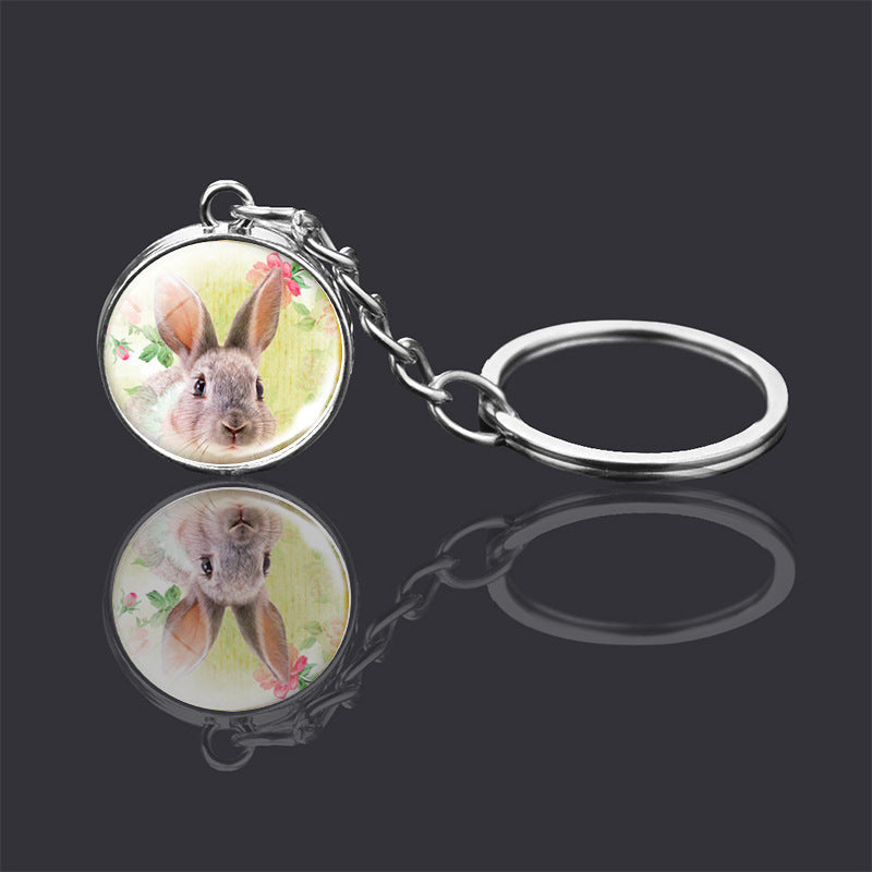 Adorno de llavero de bola de cristal de doble cara con animal