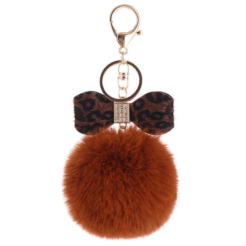 Llavero Colgante para Mochila con Bola de Pelo y Lazo de Leopardo