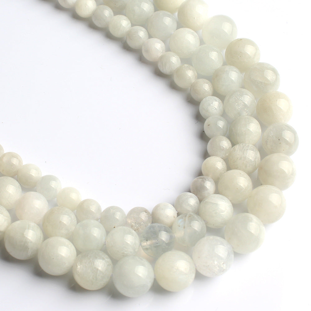 Accesorios de joyería de cuentas de piedra lunar azul blanca