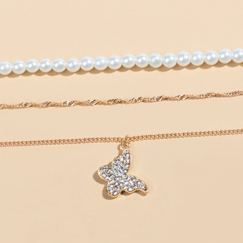 Exquisites Schmetterling Multi-Layer Perlen-Anhänger Halskette Set Damen glänzendes Temperament Freundin Party Geschenk Modeschmuck