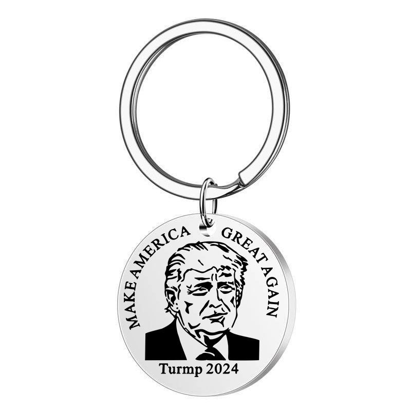 Llavero Trump de acero inoxidable redondo con letras y colgante