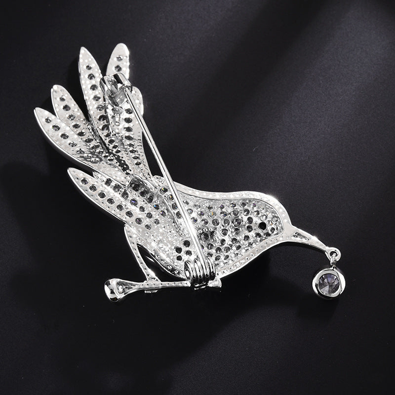 Bird brooch