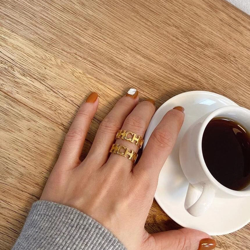Anillo de acero inoxidable calado con letras para hombre y mujer, joyería de alta calidad