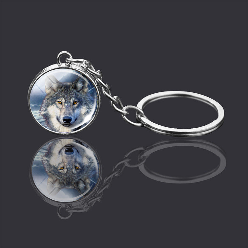 Adorno de llavero de bola de cristal de doble cara con animal