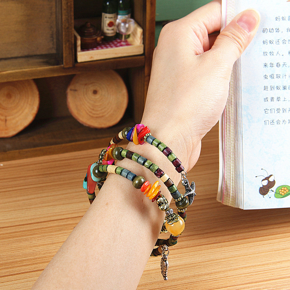 Nationaler Vintage-Holzarmreif aus buddhistischen Perlen, Muschel, Seestern-Anhänger, Holzarmband, Damenstil, Holzperlenarmband