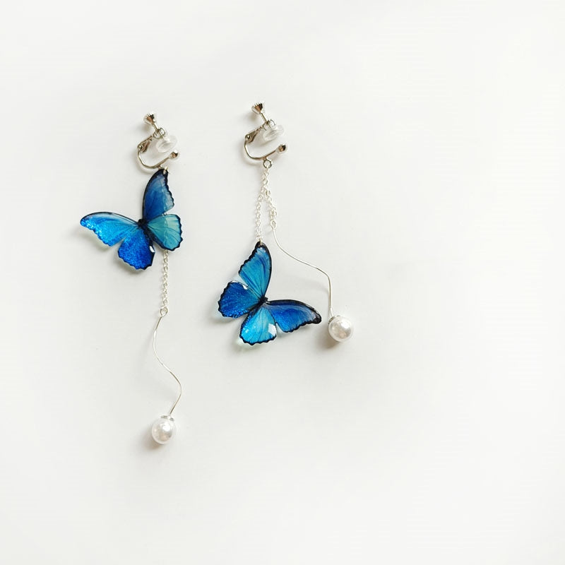 Pendientes largos de plata de ley S925 con perlas y mariposas azules