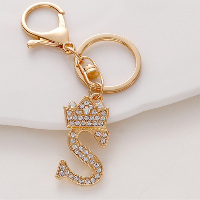 Llavero de metal con incrustaciones de diamantes y el alfabeto de la corona inglesa de 26 letras