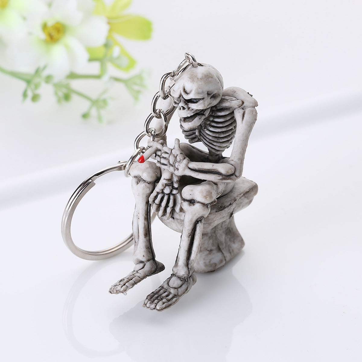 Llavero de calavera creativo con colgante de goma