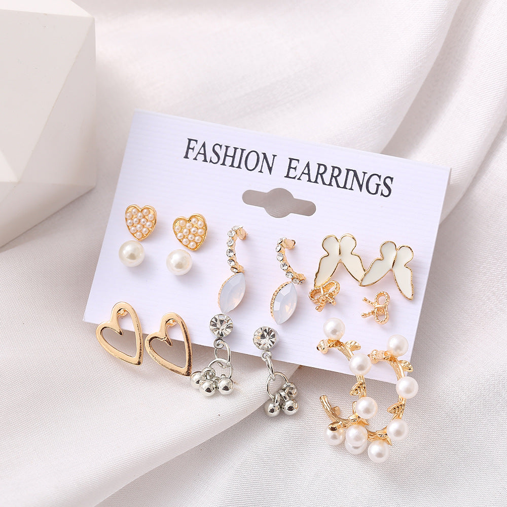 Juego de aretes de 9 pares con diseño de mariposa y corazón calado