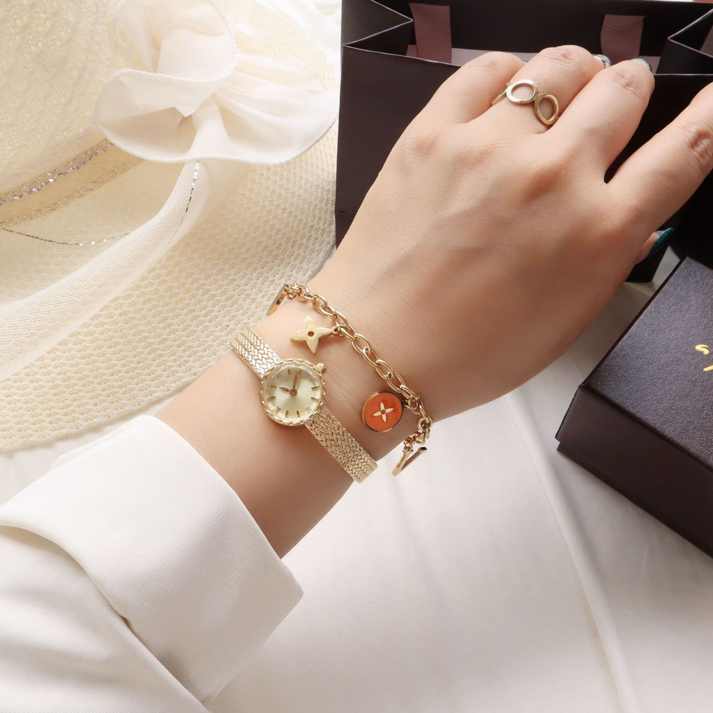 Reloj de mujer pequeño Simple Retro, de interés especial, de lujo ligero, dorado