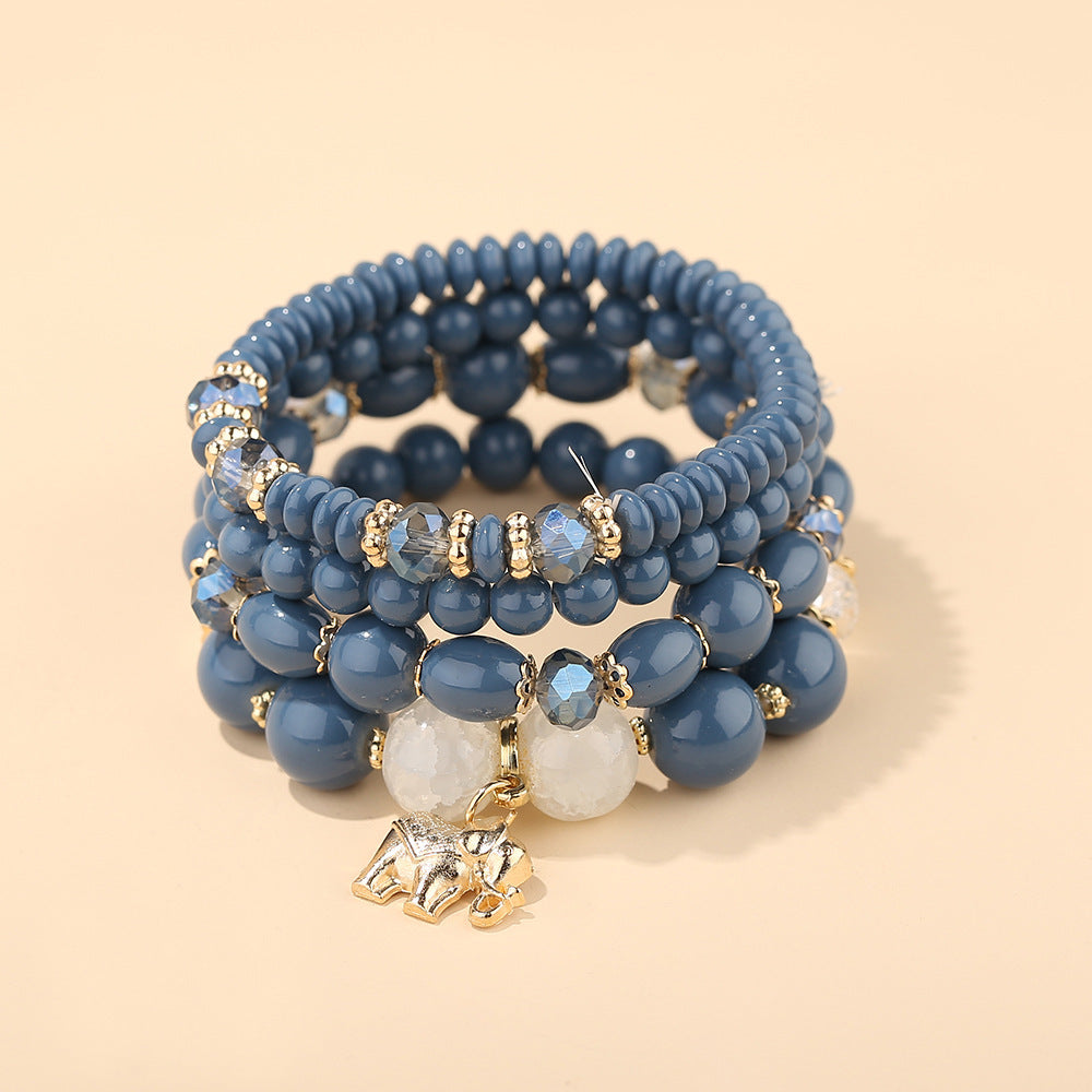Pulsera de cristal con colgante de elefante de moda para mujer