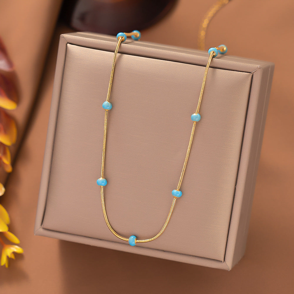 Collar de acero de titanio con bola esmaltada para mujer con un sentido incoloro y avanzado, accesorios de cadena de cuello simples y versátiles