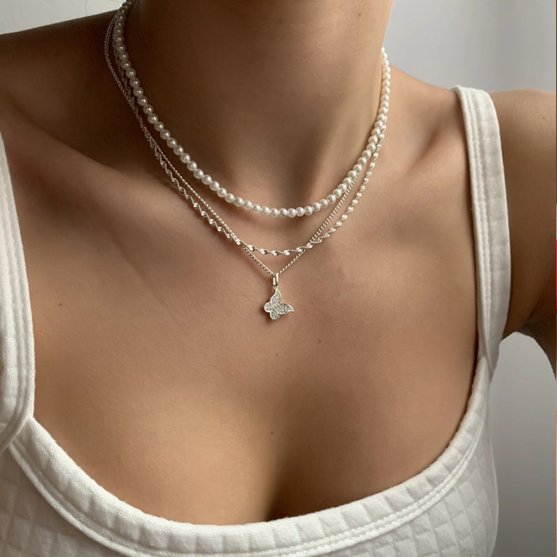 Exquisites Schmetterling Multi-Layer Perlen-Anhänger Halskette Set Damen glänzendes Temperament Freundin Party Geschenk Modeschmuck