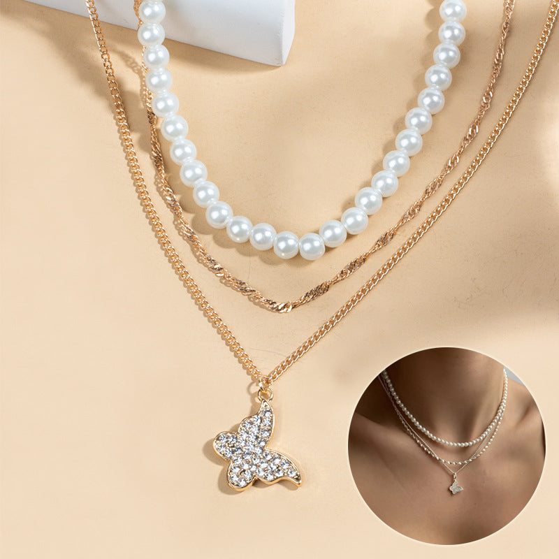 Exquisites Schmetterling Multi-Layer Perlen-Anhänger Halskette Set Damen glänzendes Temperament Freundin Party Geschenk Modeschmuck
