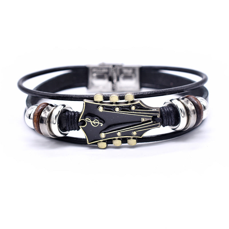 Europäische und amerikanische Zinklegierungs-Musikgitarren-Lederarmband