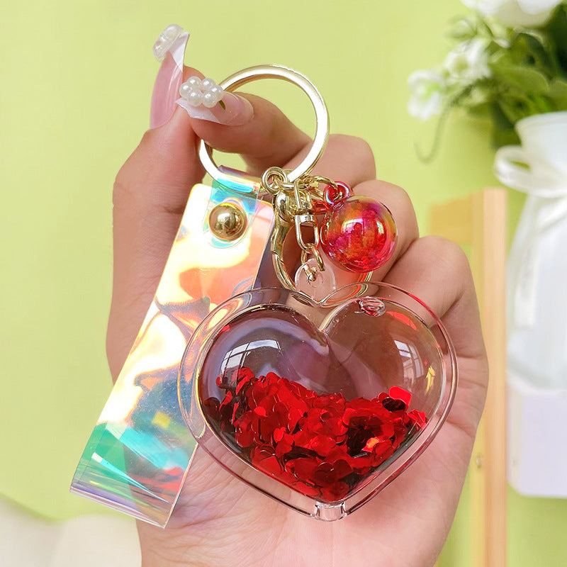 Llavero de corazón de arenas movedizas de aceite creativo