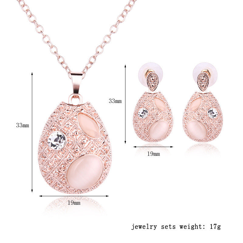 Zweiteiliges Schmuckset aus ovaler Opal-Halskette und Ohrringen