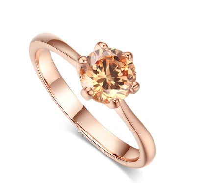 Anillo de oro rosado y circonita