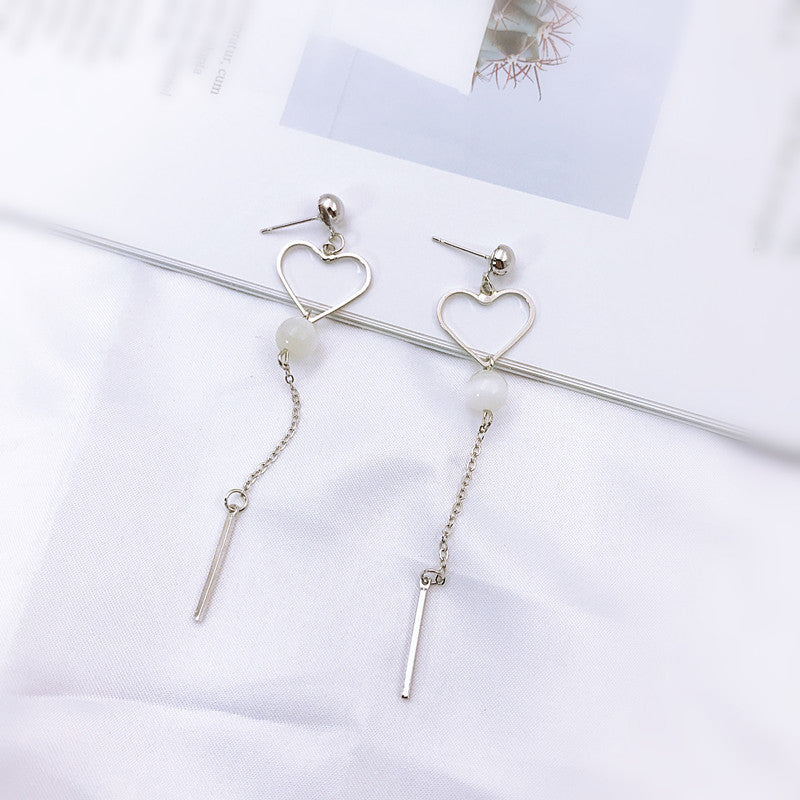 Koreanische Bogenquasten-Ohrringe asymmetrische Perlenblumen-Ohrringe