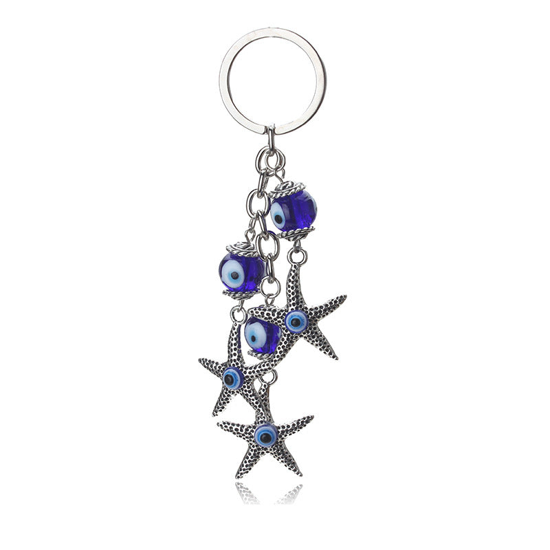 Llavero de estrella de mar, pavo, ojo azul