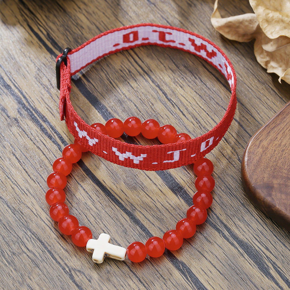 Pulsera con letras WWJD y dije de cruz turquesa