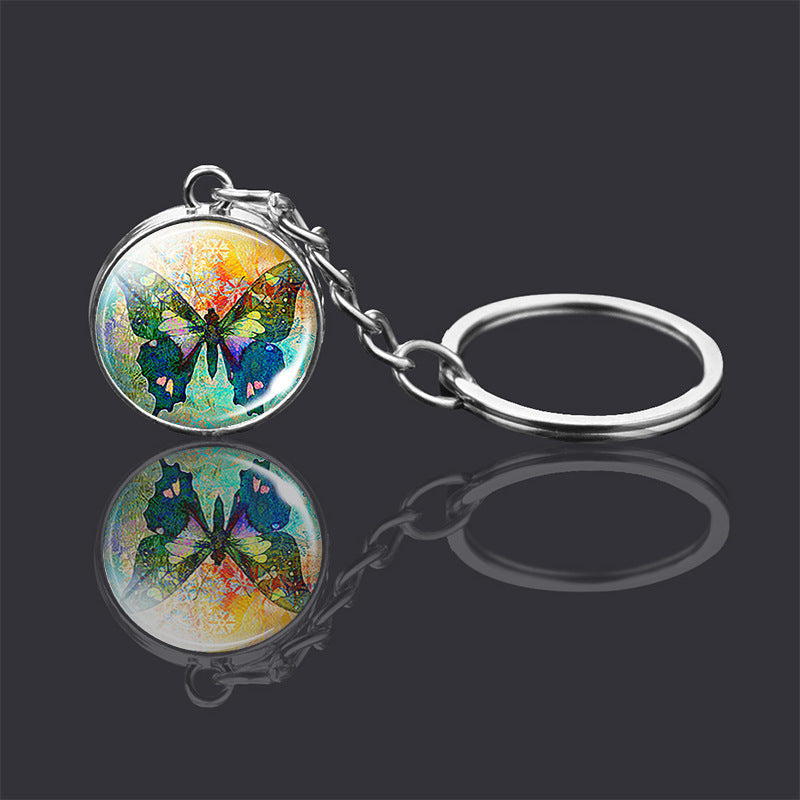 Adorno de llavero de bola de cristal de doble cara con animal