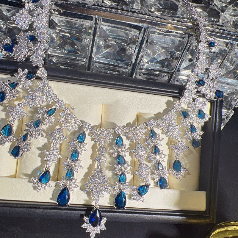 Blaues Strass-Zirkon-Quasten-Halsketten-Ohrring-Armband-Vierteiliges Set