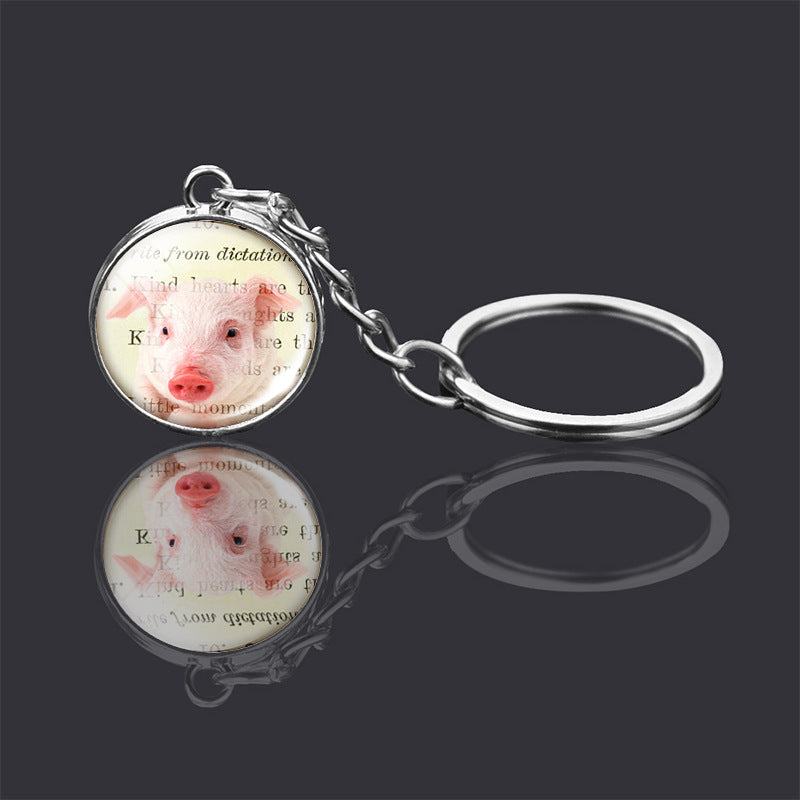 Adorno de llavero de bola de cristal de doble cara con animal