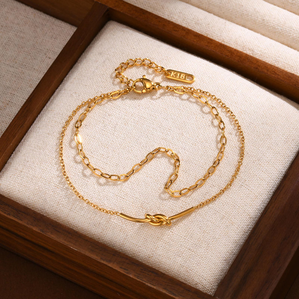 Versátil nueva pulsera doble de acero inoxidable anudada para mujer
