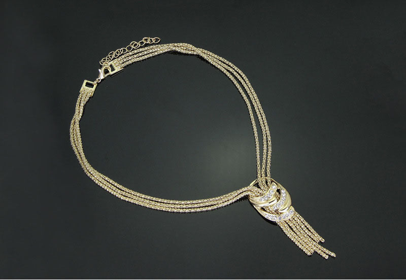 Modeschmuck-Set aus Halskette, Armband, Ohrringen und Ring
