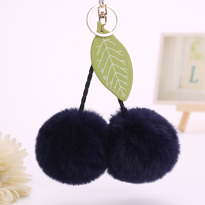 Llavero con colgante de hojas de cereza y pompón de fruta para bolso