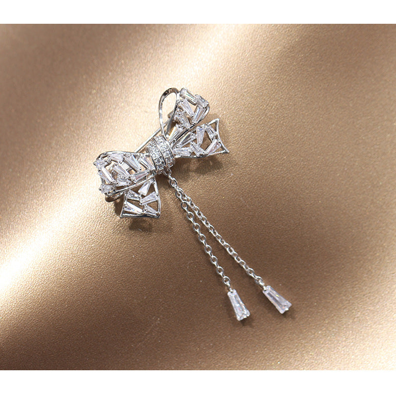 Broche tipo corsage para mujer, con incrustaciones de lazo, borla y temperamento sencillo