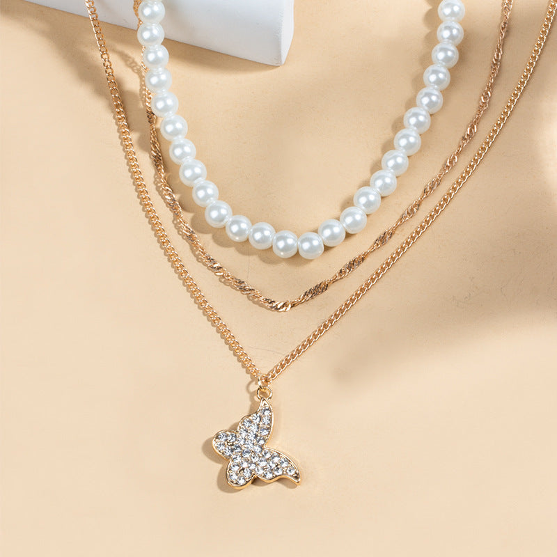 Exquisites Schmetterling Multi-Layer Perlen-Anhänger Halskette Set Damen glänzendes Temperament Freundin Party Geschenk Modeschmuck