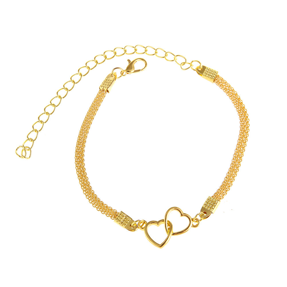 Tobillera de moda con cadena plana y dos corazones