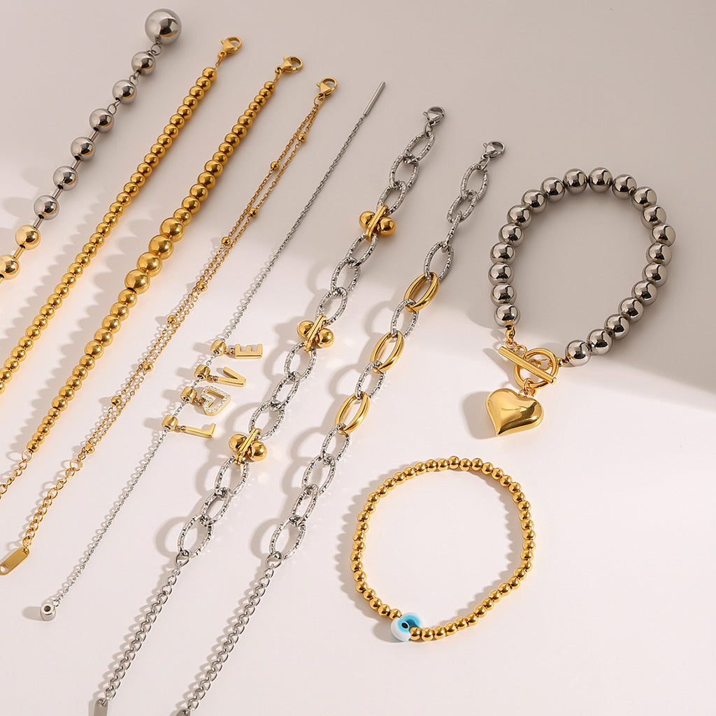 Europäisches und amerikanisches Edelstahl-Perlenarmband mit hohem Gefühl und farblich passenden Buchstaben