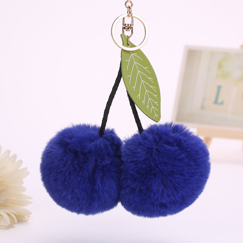 Llavero con colgante de hojas de cereza y pompón de fruta para bolso