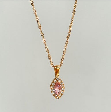 Collar de acero titanio con circonita ojo de caballo en forma de aceituna y perforación completa