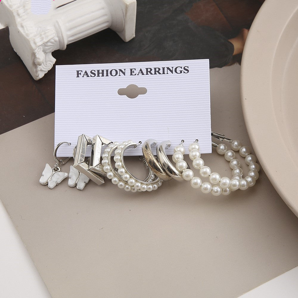 Pendientes de aro de perlas de acrílico con mariposa de gran venta