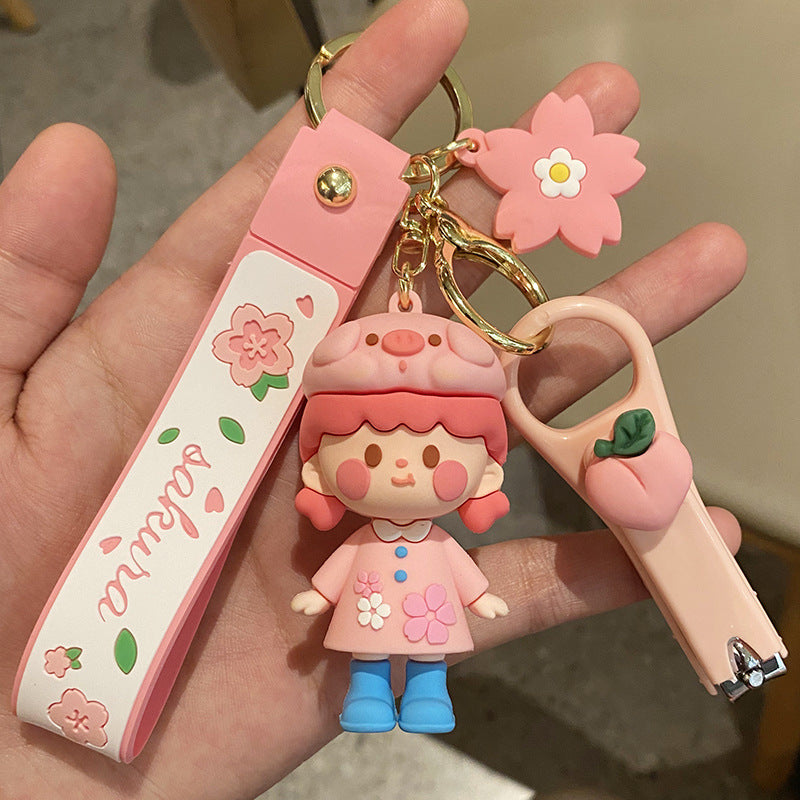 Nuevos Llaveros con Diseño de Muñeca de Niña con Flores de Cerezo