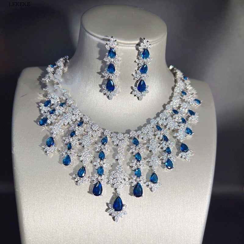 Blaues Strass-Zirkon-Quasten-Halsketten-Ohrring-Armband-Vierteiliges Set