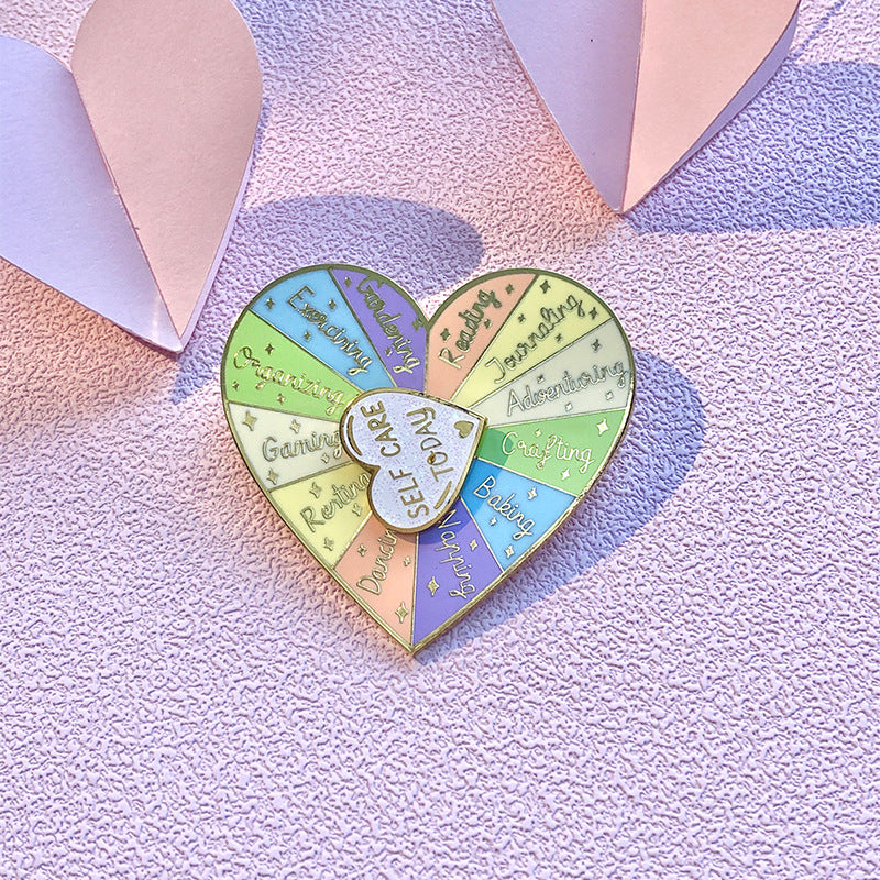 Distintivo giratorio con forma de corazón doble capa para mujer