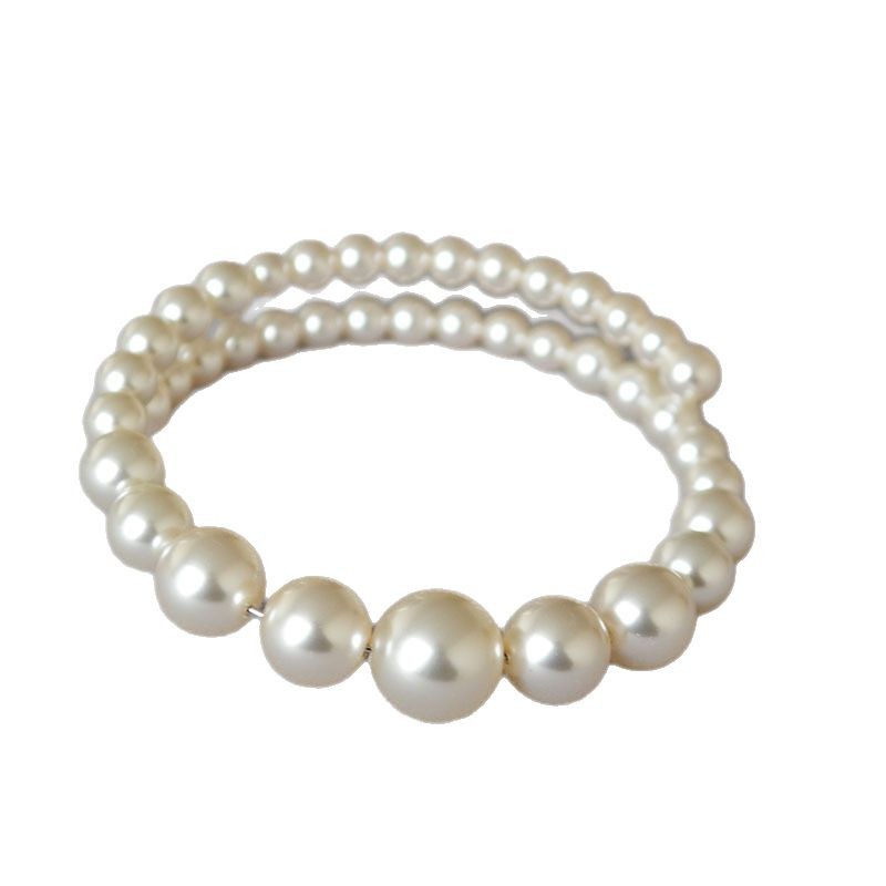 Pulsera de perlas de tamaño degradado para damas elegantes