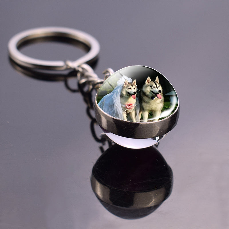 Colgante de bola de cristal con diseño de animales y llavero luminoso de moda