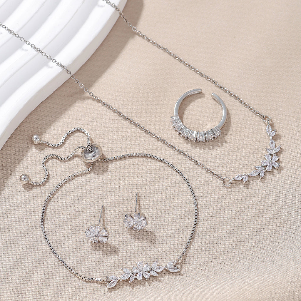 Schlichtes, elegantes Zirkon-Schmuckset, silberne Blumenkette, exquisite Ohrringe, Armband, Ring, geeignet für den täglichen Gebrauch von Frauen im Urlaub